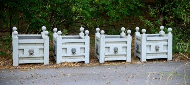 A SET OF FOUR GREY PAINTED TEAK AND BRASS MOUNTED RECTANGULAR PLANTERS, CONTEMPORARY