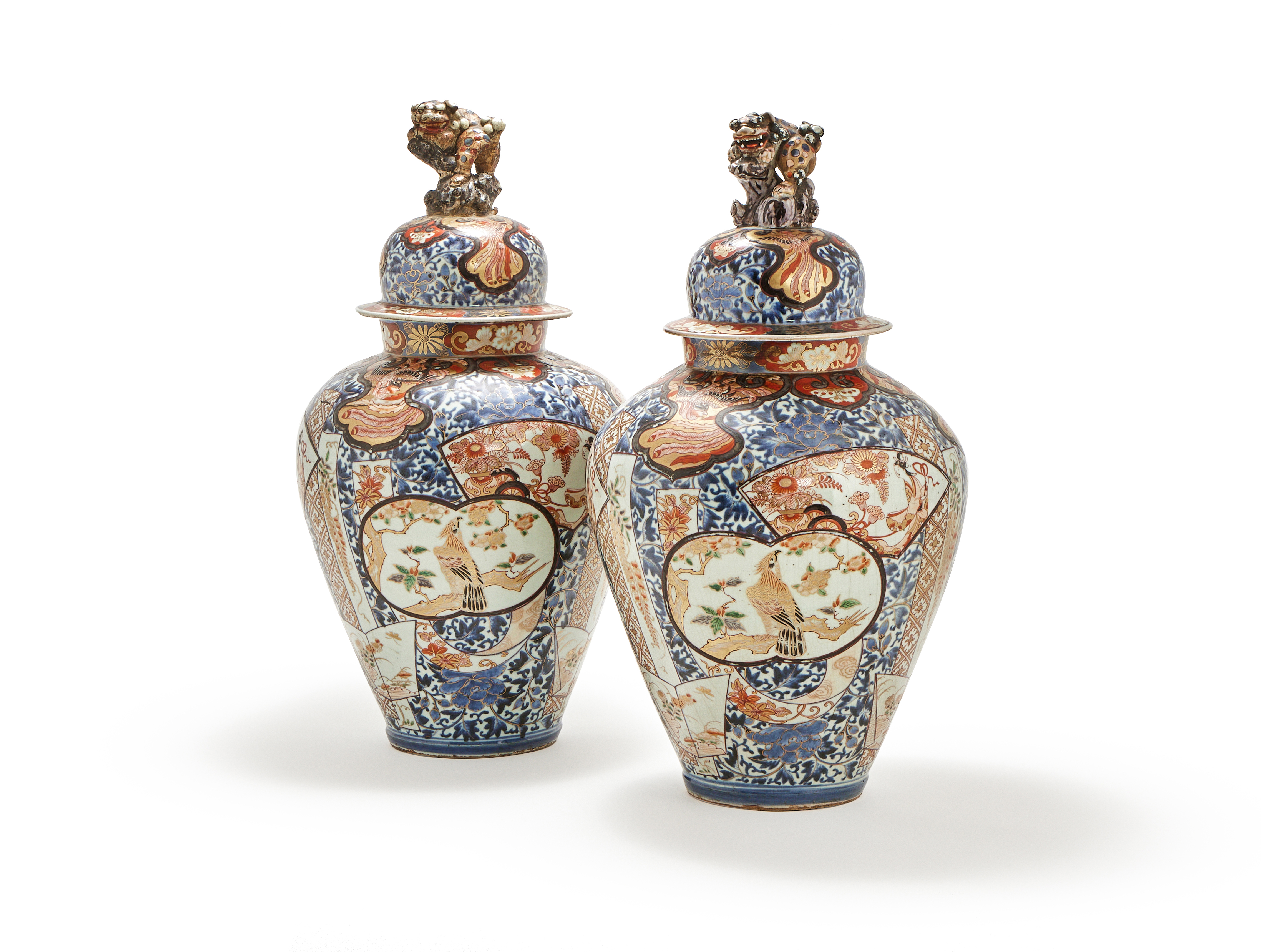 A pair of Japanese Imari baluster vases and covers, Edo Period, late 17th or early 18th century
