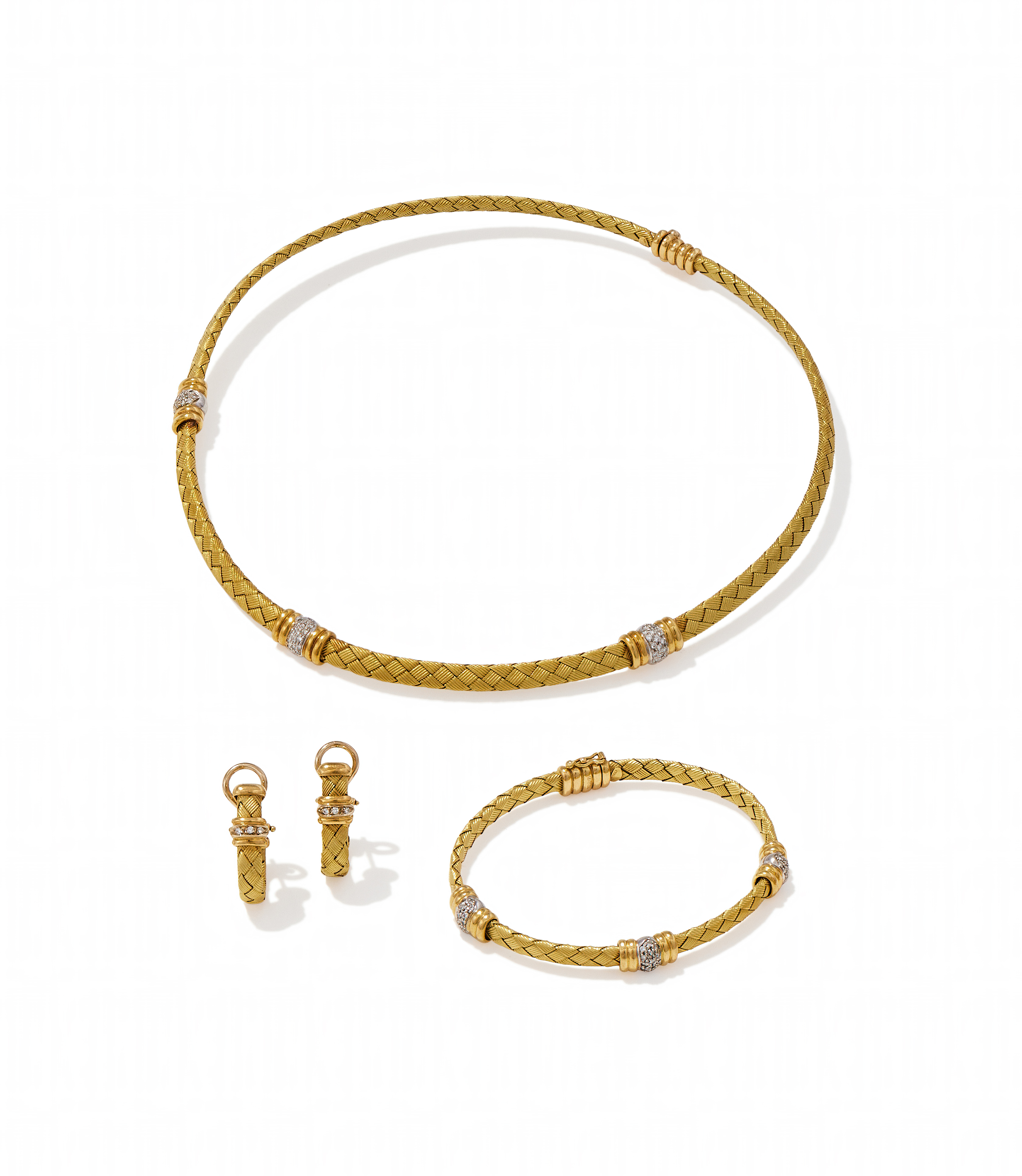 A DIAMOND SET NECKLACE, BRACELET AND EARRING SUITE