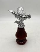 A Rolls-Royce Kneeling Lady Mascot As featured on post-war models such as the Silver Cloud.