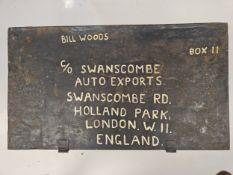 A large metal trunk addressed ' Bill Woods c/o Swanscombe Auto Exports A large metal trunk addressed