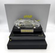 A Porsche 918 Spyder Promotional Bundle  A bundle of collectible items for the 918 Spyder model,