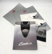 Bugatti, Pagani, Rolls-Royce and Land-Rover brochures and other marketing materials Bugatti