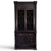 Tall 19th century Flemish Gothic Revival heavily carved inverted breakfront enclosed alcove bookcase