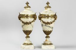 pair of antique neoclassical covered urns in white marble and gilded bronze with ram's heads and fes