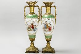 pair of 19th Cent. vases in finely painted Sèvres porcelain with female figures and cupids & with a 