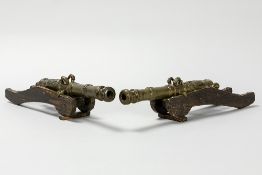 pair of antique miniature bronze canons (dated 1651) on their wooden carriage