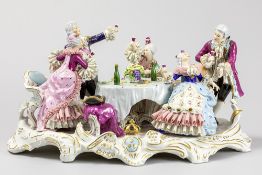quite big group of figures in  marked (lace-)porcelain with a Louis XV theme 