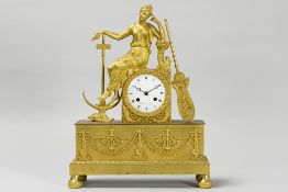 nice, presumably French Empire clock with an ormulu case (gilded bronze) adorned with a lady and oth