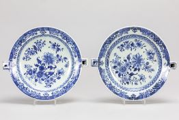 pair of 18th Cent. Chinese warming dishes in porcelain with a floral blue-white decor