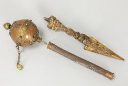 two pieces in copper alloys : a ritual dagger and a prayer roll partly in wood