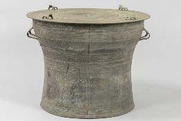 antique bronze Vietnamese so called 'rain drum' with typical ornamentation and on top four stylized 