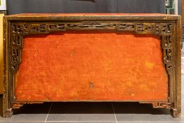 antique Chinese chest with a red-lacquered top with two shutters