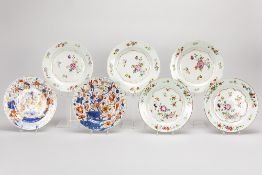 seven 18th Cent. Chinese plates in porcelain of which a series of three and a pair with Famille Rose