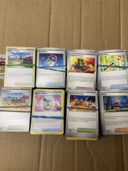 BUNDLE OF X200 TRAINER POKEMON CARDS