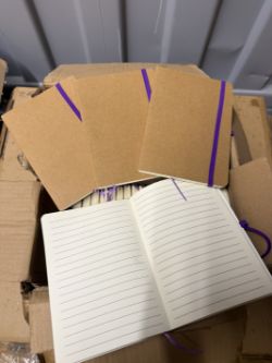 JOBLOT BOX OF 100 B6 BROWN NOTEBOOKS WITH PURPLE CLOSURE