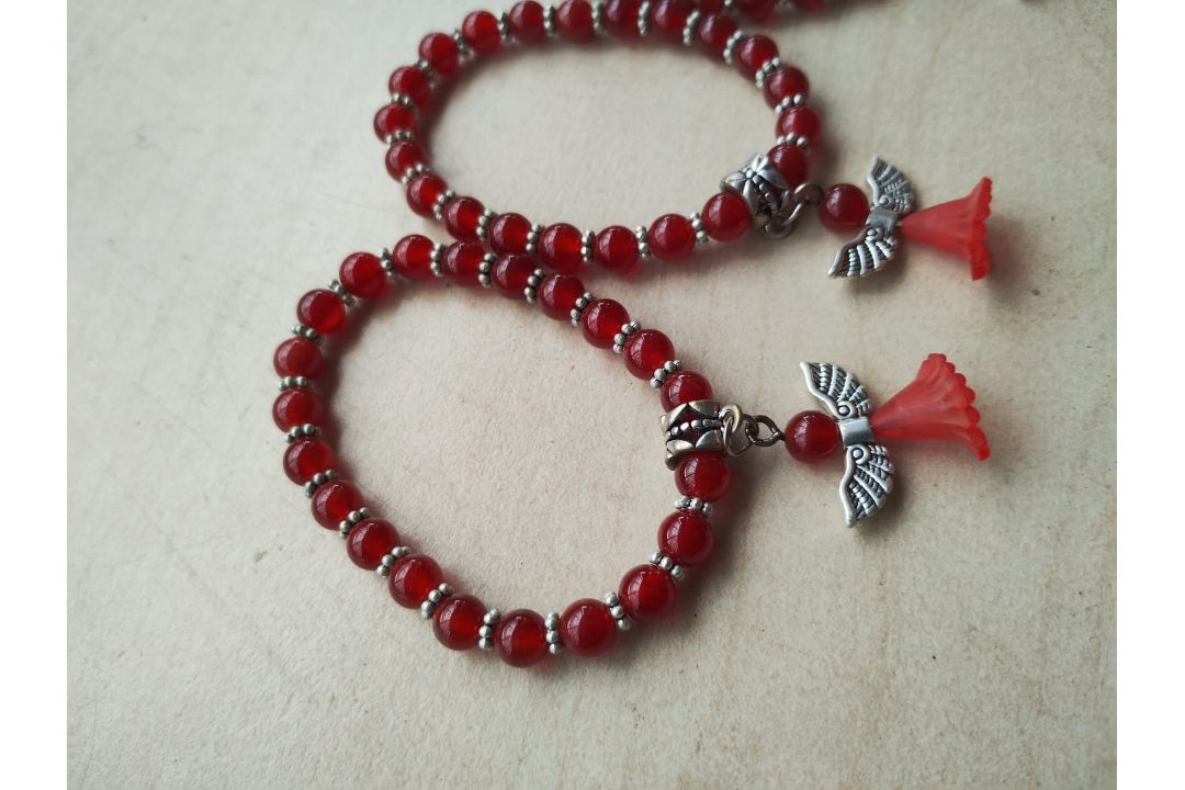 RED CATS EYES + WOODEN - ANGELS BALL CRYSTAL BRACELETS - NEW IN ORIGINAL PACKAGING - JOBLOT OF 12 - Image 1 of 4