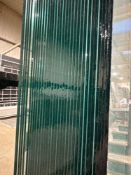 Thirty two 4mm clear glass