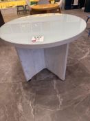 Round glass topped table