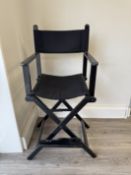 Black upholstered foldable chair