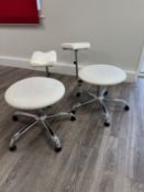 Four assorted white leather upholstered stools