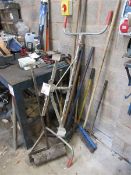 Assortment of various hand tools including roller, brooms, hammers, post compactor, etc Please note;