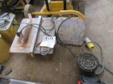 240v unbranded portable table saw & 110v site light Please note; This LOT is located at Roadform