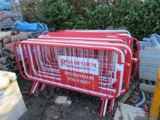 C.31 red and white metal interlocking pedestrian fences Please note; This LOT is located at Roadform