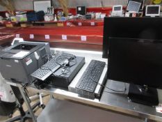 Two desktop monitors, one PC, two keyboards, and one Brother HL-L5000D printer Please note; This LOT
