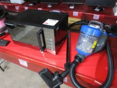 Amazon Basics vacuum cleaner and Russell Hobbs microwave Please note; This LOT is located at