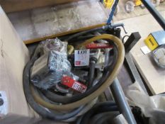Three Plusl hand pumps, one high accuracy meter (L) and assorted hosing Please note; This LOT is