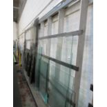 Assorted size and thickness clear and smoked glass, as lotted