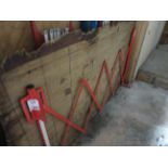 Three concertina pedestrian barriers