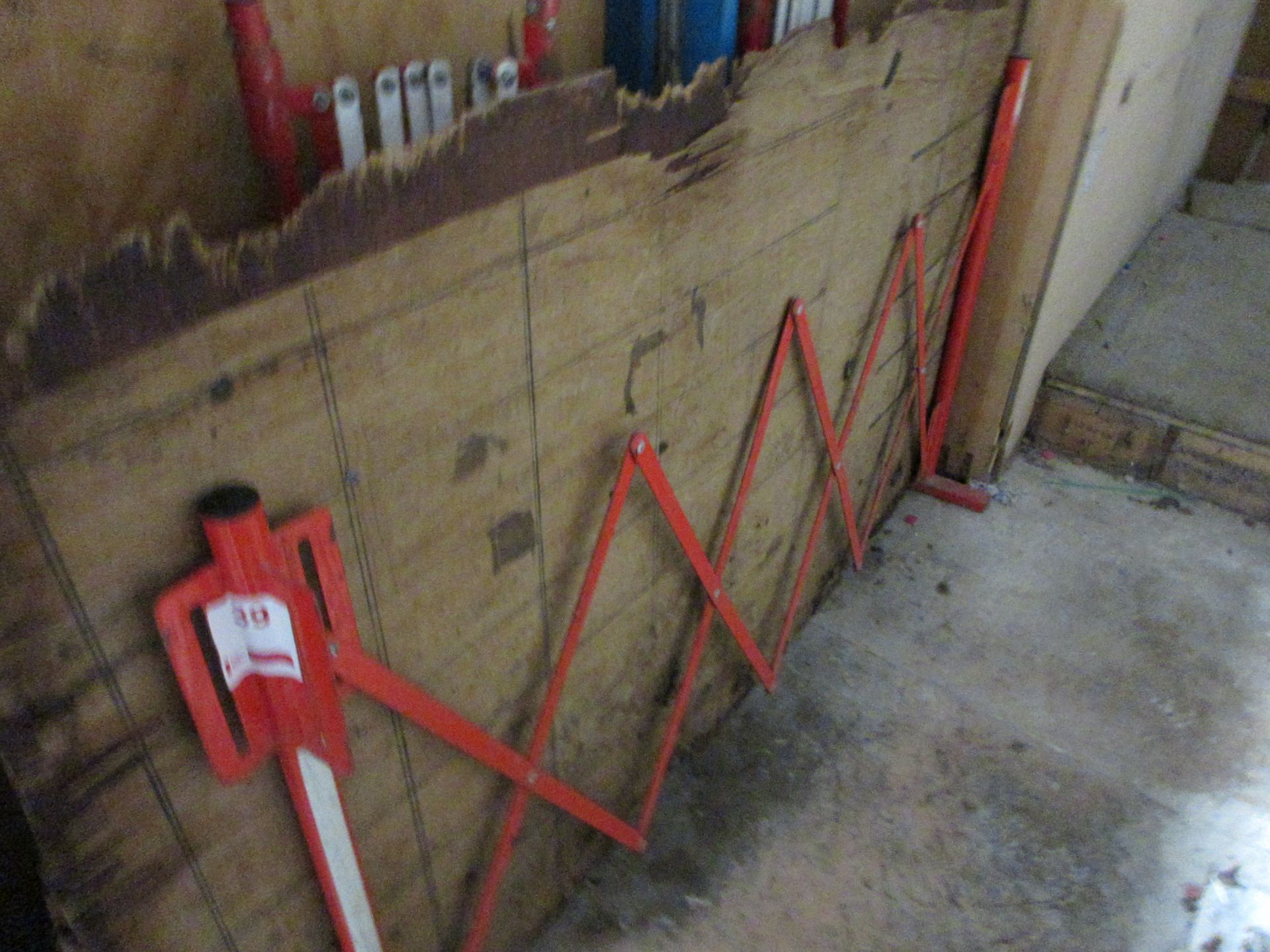 Three concertina pedestrian barriers