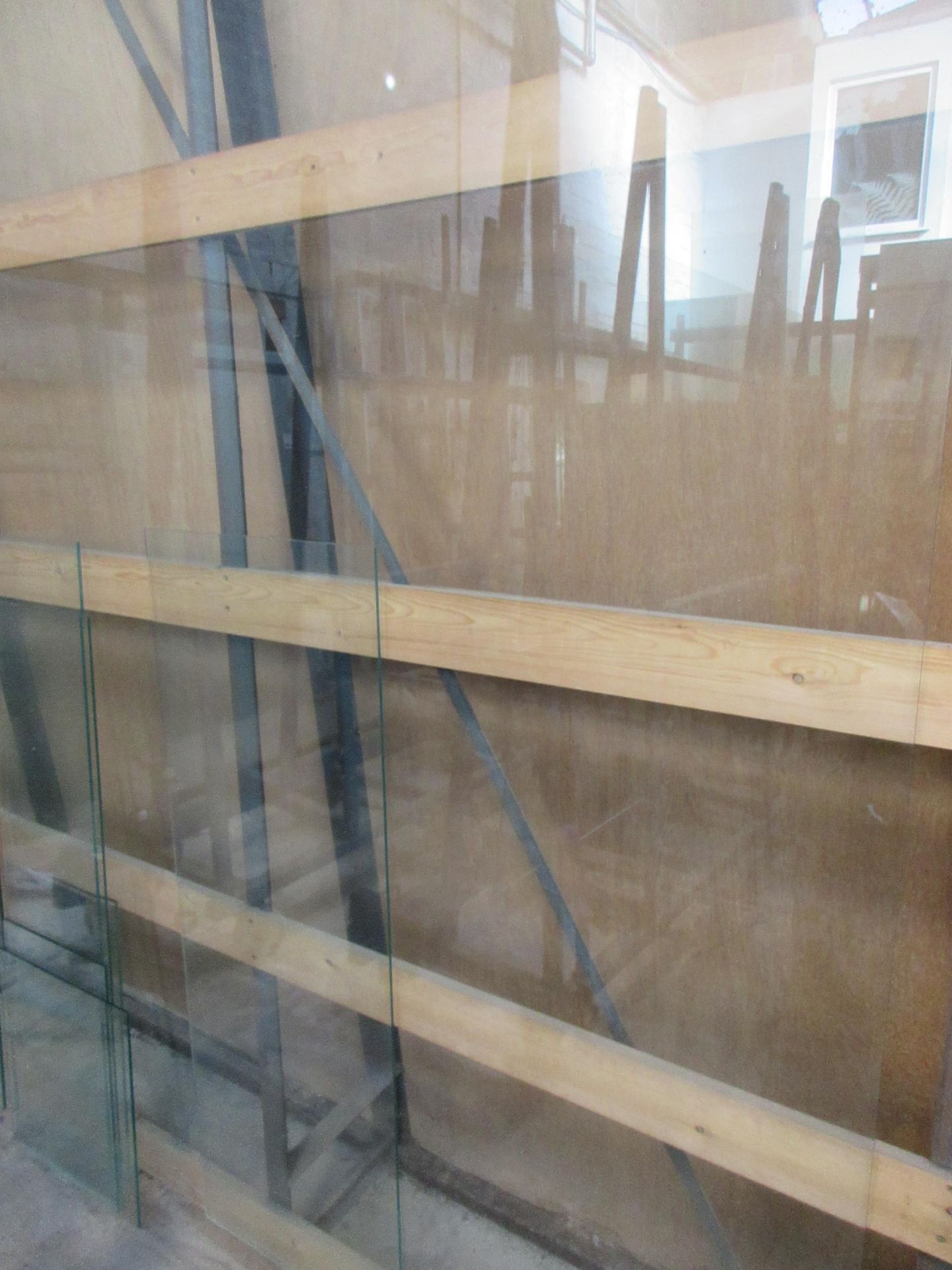 Three sheets of various size and thickness clear glass, as lotted