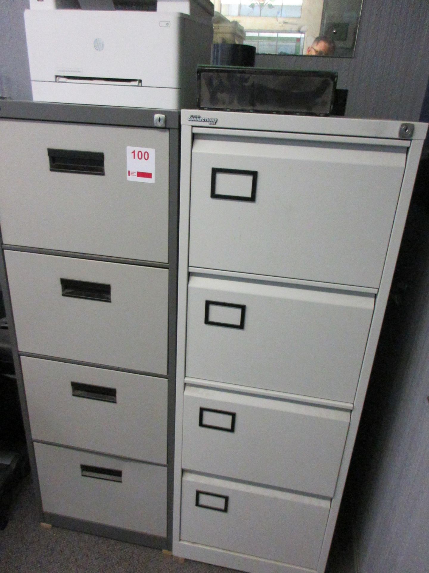 Two metal 4drawer filing cabinets