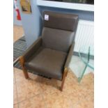 Two timber frame leatherette chairs