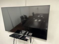 Toshiba 65" wall mounted television, with remote