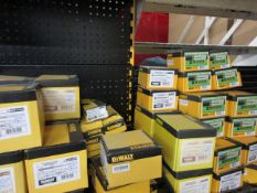 Quantity of assorted Dewalt fastenings including blue tip bolts, hammer screws, pins, concrete