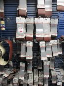 Contents of shop display rack including Bosch wood & paint sanding belts various grades, P240