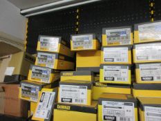 Quantity of assorted Dewalt fastenings including blue tip bolts, hammer screws, pins, concrete