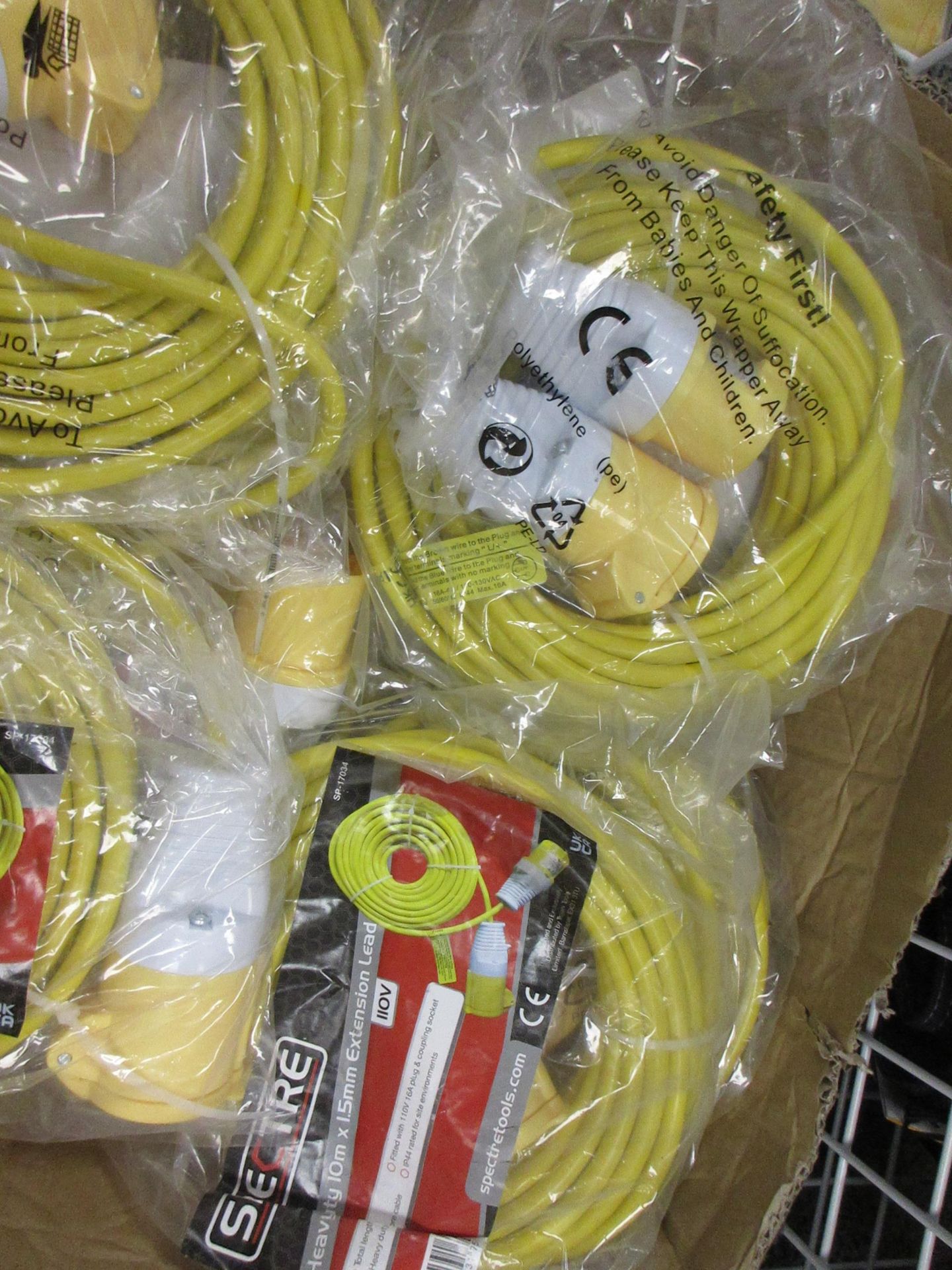 Twelve Spectre heavy duty 10m x 1.5mm extension leads, 110v