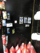Contents of shop display rack including metric thread repair kits, funnels, oil jigs, brake cap