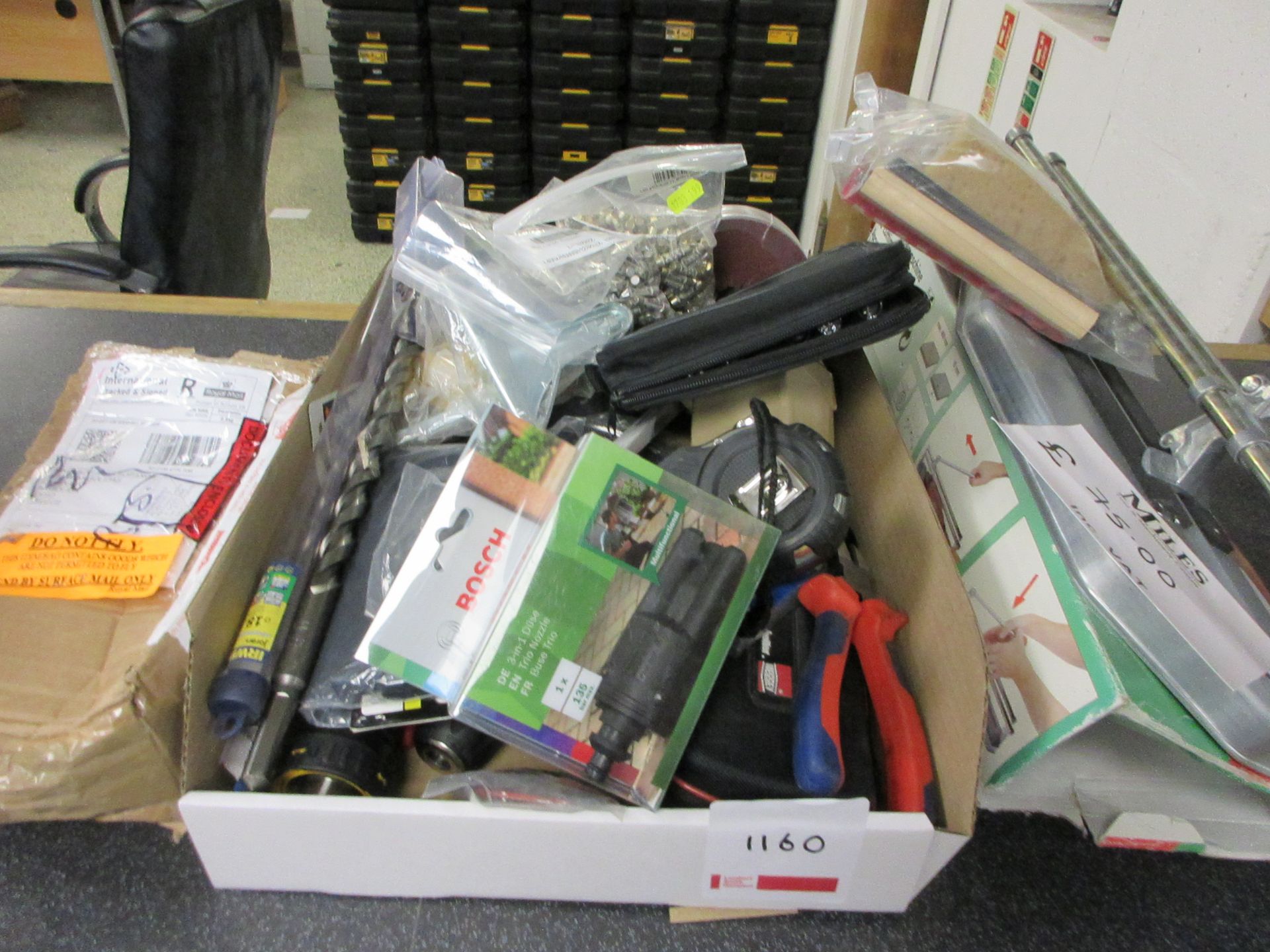 Miscellaneous lot including manual tile cutter, hand tools, tape measurers, beanie & hat, drill