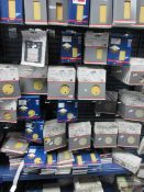 Contents of shop display rack including Bosch wood & paint sanding belts & discs various grades,