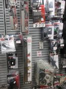Contents of Trend shop display rack including digital angle rules, clamp kits, door clamps,