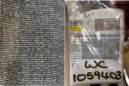 Part roll of black and white patterned carpet
