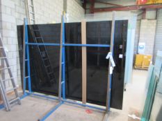 Eleven sheets of smoked glass, 3.2m x 2.1m x 6m