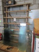 Three assorted timber single & double sided static glass racks, as lotted