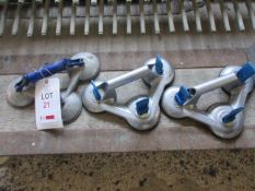 Four various suction cups